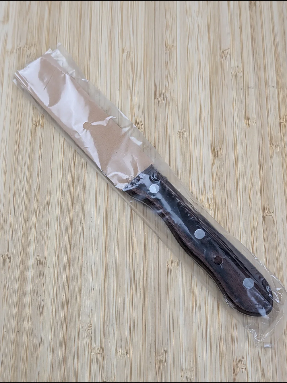 ZWILLING Serrated Steakhouse Steak Knife - Brown Wood Handle, Stainless Blade